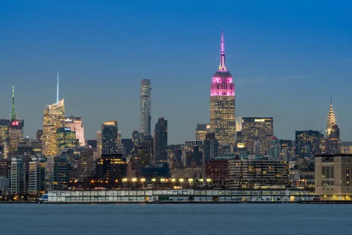 Framed Print : Midtown skyline at dusk with the Empire State Building in pink and white colors, Manhattan Framed Print : Midtown skyline at dusk with the Empire State Building in pink and white colors, Manhattan
