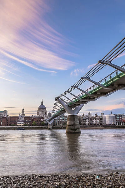 Millennium Bridge and St. Pauls Cathedral at sunset, City of London, London, UK