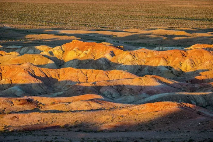 Framed Print : Mineral streaked white sand-hills of Tsagaan Suvarga (White Stupa) at sunset, Mongolia Framed Print : Mineral streaked white sand-hills of Tsagaan Suvarga (White Stupa) at sunset, Mongolia