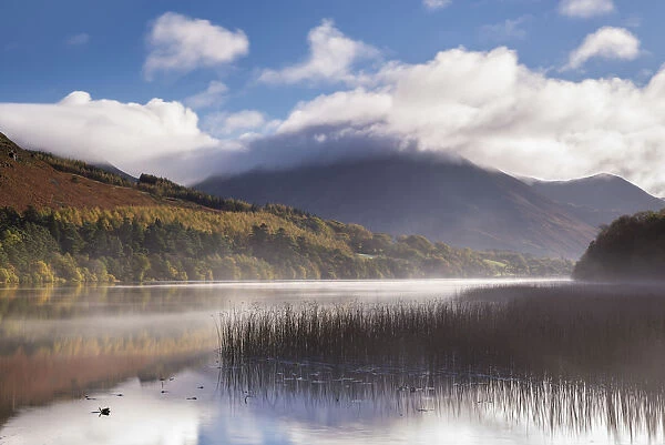 Mist clears over Loweswater on a beautiful autumn morning, Lake District, Cumbria