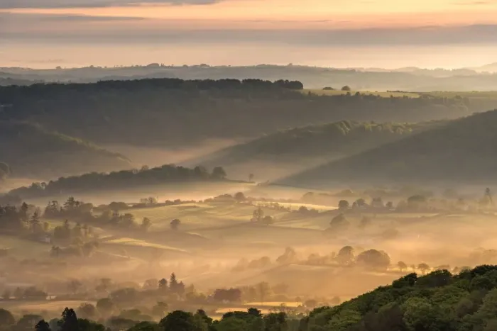 Framed Print : Mist covered rolling countryside at dawn, Dartmoor National Park, Devon, England Framed Print : Mist covered rolling countryside at dawn, Dartmoor National Park, Devon, England