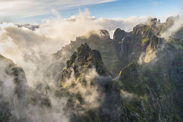 Mist on the peaks from Vereda do Areeiro. Pico do Arieiro, Funchal, Madeira Island