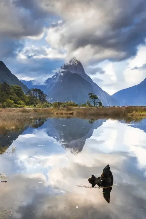 Framed Print : Mitre Peak reflecting in the fjord water at sunset at Milford Sound in New Zealand