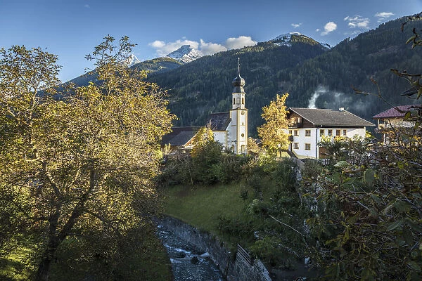 Mitteldorf in the Virgen valley with the Chapel of Saint Magdalena, East Tyrol, Austria