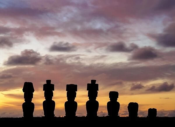 Moais in Ahu Nau Nau by the Anakena Beach at sunset, Rapa Nui National Park, Easter Island