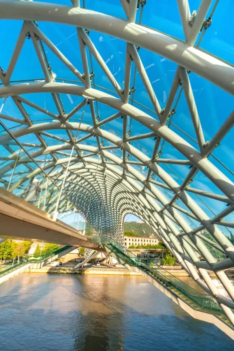 Framed Print : The modern architecture of Pace bridge over Kura river. Tbilisi, Georgia Framed Print : The modern architecture of Pace bridge over Kura river. Tbilisi, Georgia