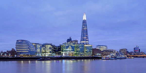 Modern Architecture by the Queens Walk and The Shard at twilight, London, England