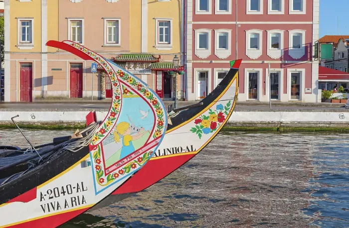 Framed Print : Moliceiro boats floating on Aveiro main canal, Aveiro, Portugal Framed Print : Moliceiro boats floating on Aveiro main canal, Aveiro, Portugal