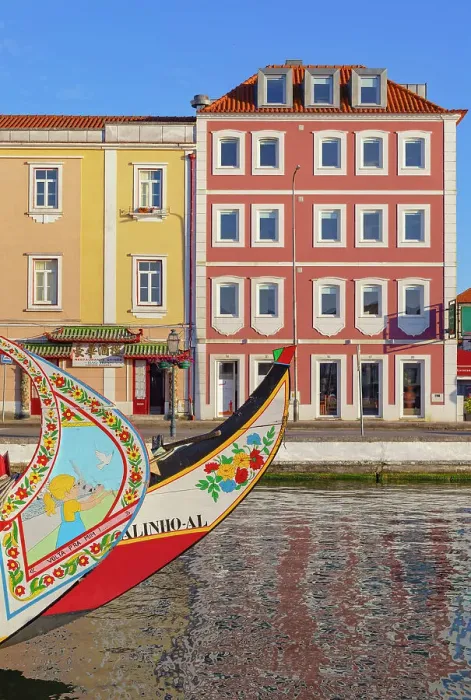 Framed Print : Moliceiro boats floating on Aveiro main canal, Aveiro, Portugal Framed Print : Moliceiro boats floating on Aveiro main canal, Aveiro, Portugal
