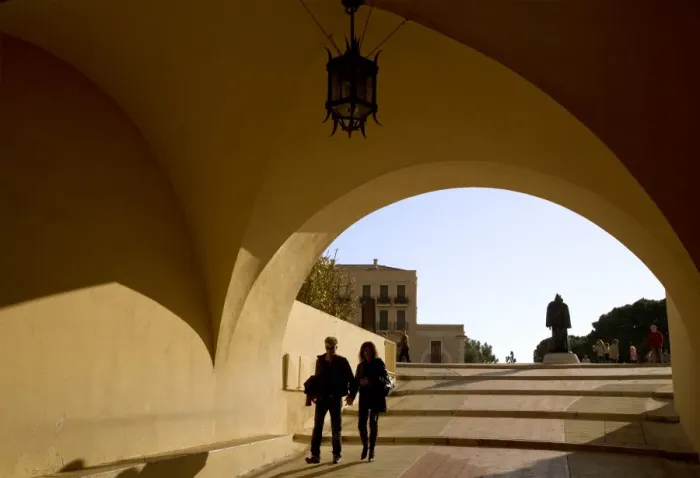 Framed Print : Monaco, Cote D Azur, Monaco Ville; A couple passing through the tunnel leading to the main square in