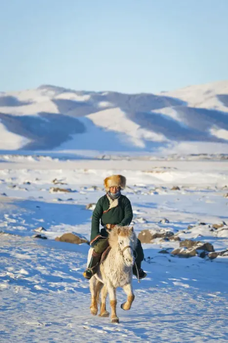 Framed Print : Mongolia, Ovorkhangai, Orkkhon Valley. A man approaches on horseback at sunrise