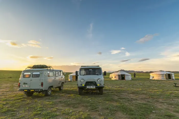 Framed Print : Mongolian nomadic traditional gers and soviet minivans at sunset. Middle Gobi province Framed Print : Mongolian nomadic traditional gers and soviet minivans at sunset. Middle Gobi province