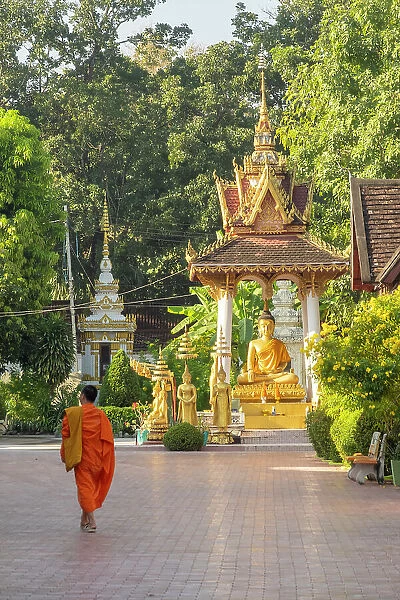Monk walking in Wat Sisaket, Vientiane (capital city), Laos