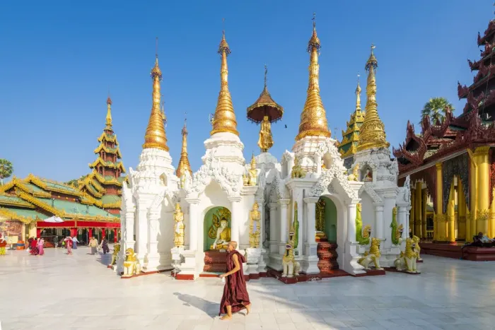 Framed Print : Monk walking by White temple in Shwedagon Pagoda complex, Yangon, Yangon Region, Myanmar Framed Print : Monk walking by White temple in Shwedagon Pagoda complex, Yangon, Yangon Region, Myanmar