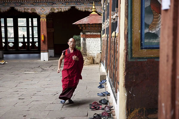 Monks in the Bhuddist temple or Dzong in Paro, Bhutan