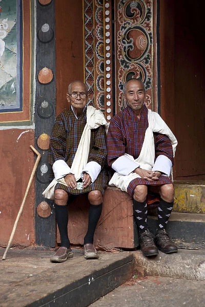 Monks in the Bhuddist temple or Dzong in Paro, Bhutan