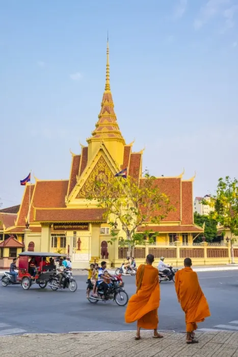 Framed Print : Two monks cross the street in front of the Cambodian Supreme Court, Phnom Penh, Cambodia Framed Print : Two monks cross the street in front of the Cambodian Supreme Court, Phnom Penh, Cambodia