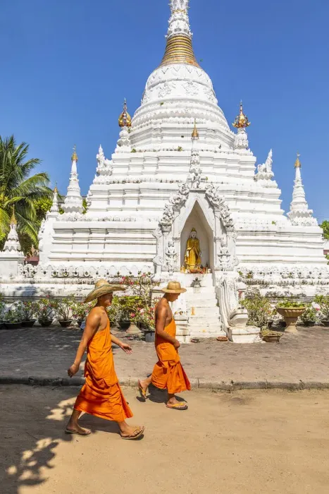 Framed Print : Two monks walking past a stupa in Wat Phan On temple complex, Chiang Mai Framed Print : Two monks walking past a stupa in Wat Phan On temple complex, Chiang Mai