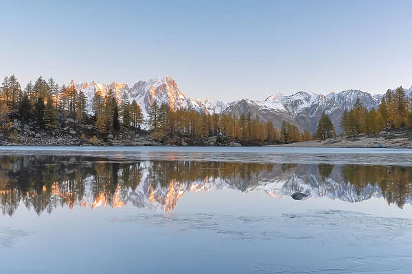 Mont Blanc massif reflected in Lake d Arpy, municipality of Morgex, Valle d Aosta
