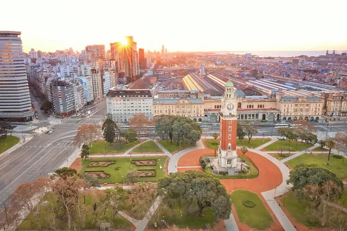 Framed Print : The Monumental Tower with the Retiro Train Station and La Plata River in the background at sunset, Buenos Aires, Argentina