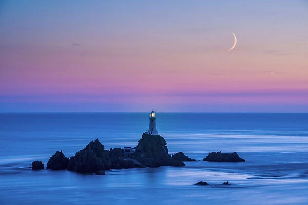 Moon over Corbiere Lighthouse, Jersey, Channel Islands