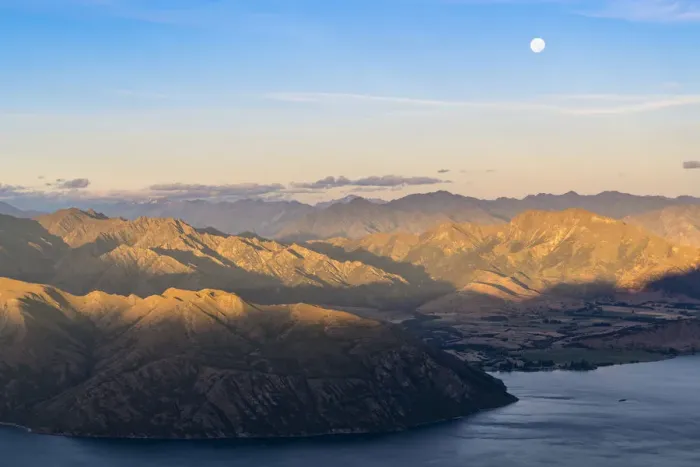 Framed Print : Moon over Lake Wanaka at sunset shot from Roys Peak track