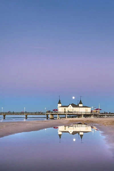 Full moon above the pier, Ahlbeck, Usedom island, Mecklenburg-Western Pomerania, Germany