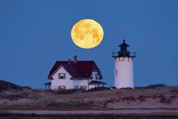 Framed Print : Full moon setting over Race Point Lighthouse, Cape Cod, Provincetown, Massachusetts, USA Framed Print : Full moon setting over Race Point Lighthouse, Cape Cod, Provincetown, Massachusetts, USA