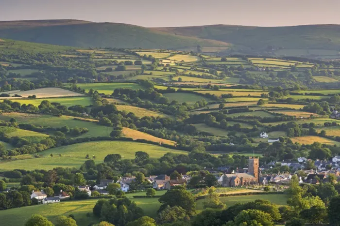 Framed Print : Moretonhampstead church and town surrounded by beautiful rolling countryside, Dartmoor Framed Print : Moretonhampstead church and town surrounded by beautiful rolling countryside, Dartmoor
