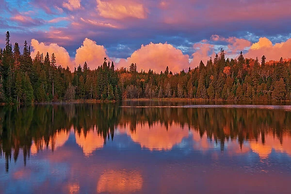 Morning clouds reflected in Crozier Lake in Algoma District North of Lake Superior Provincial Park, Ontario, Canada