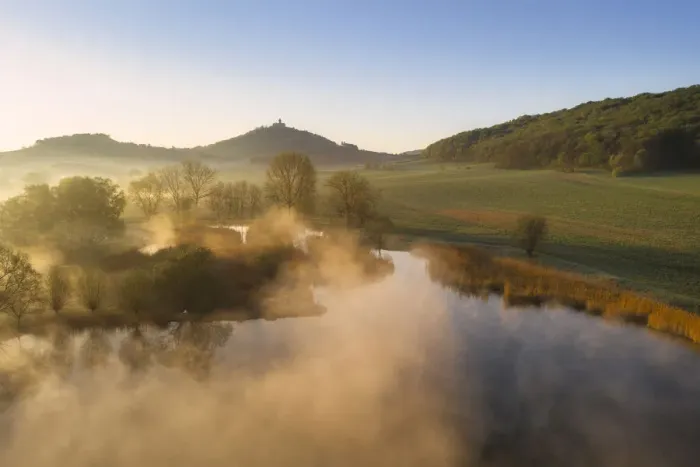 Framed Print : Morning mist over pond with Wachsenburg castle in the background Framed Print : Morning mist over pond with Wachsenburg castle in the background