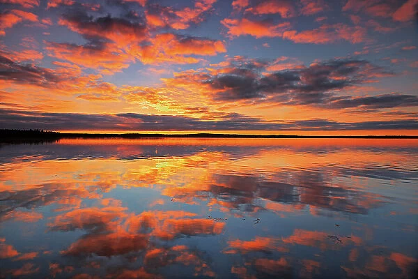 Morning reflection in Namekus Lake Prince Albert National Park Saskatchewan, Canada
