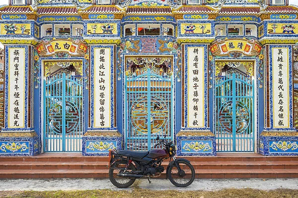 Motorbike parked in front of temple, Thuy Thanh village, Huong Thuy District, Thua