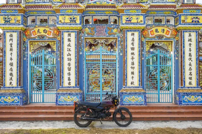 Framed Print : Motorbike parked in front of temple, Thuy Thanh village, Huong Thuy District, Thua