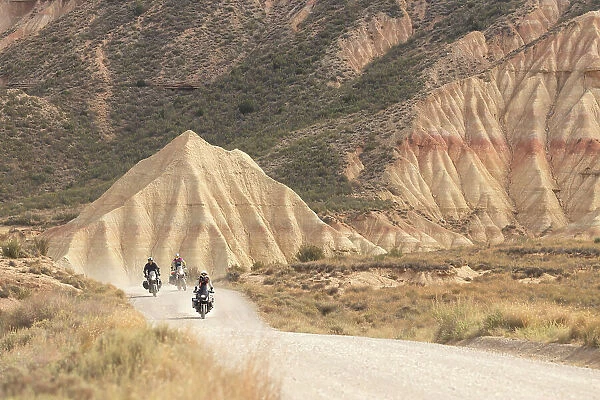 Motorcyclists, Castel de Tierra, Bardenas Reales Natural Park, Navarra, Spain