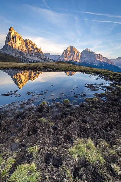 Mount Gusela and Tofane group are mirrored in a pond, Giau pass, Cortina d Ampezzo