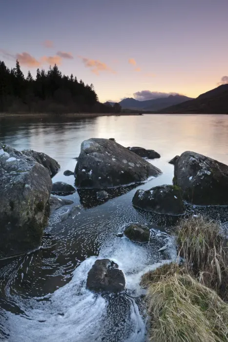 Framed Print : Mount Snowdon at dusk viewed from the rocky shores of Llynnau Mymbyr, Snowdonia National Framed Print : Mount Snowdon at dusk viewed from the rocky shores of Llynnau Mymbyr, Snowdonia National