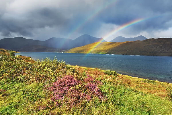 Mountain landscape with rainbow at Loch Ainot - United Kingdom, Scotland, Inner Hebrides
