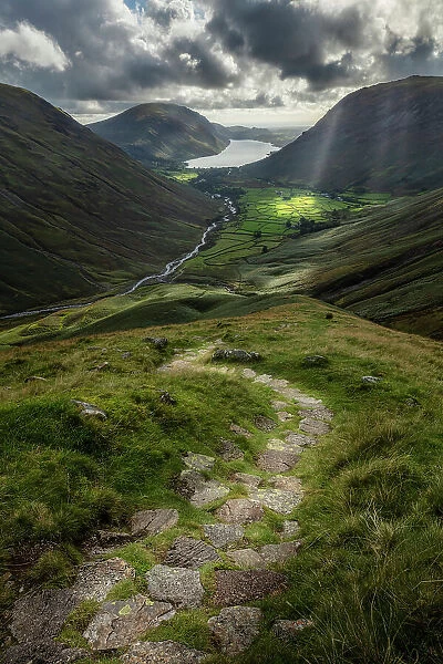 Mountain path leading towards Wasdale Head and Wast Water from Great Gable, Lake District National Park, Cumbria, England, UK