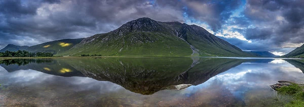 Mountain reflecting in River Etive, Glen Etive, Highland Region, Scotland, United Kingdom