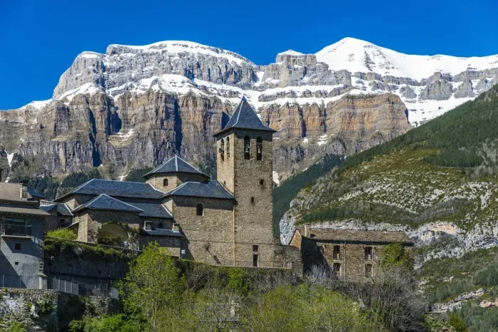 Framed Print : The mountain village of Torla with the snowy Pyrenees behind, Huesca, Aragon, Spain Framed Print : The mountain village of Torla with the snowy Pyrenees behind, Huesca, Aragon, Spain