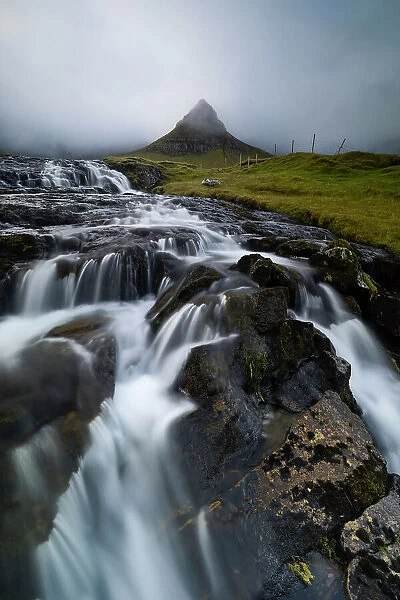 The mountain and waterfall near Gjogv, Sunda municipality, Eysturoy, Faroe Islands, Denmark