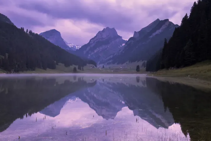 Framed Print : Mountains are reflected in the Samtisersee at sunrise, Canton of Appenzell, Alpstein Framed Print : Mountains are reflected in the Samtisersee at sunrise, Canton of Appenzell, Alpstein