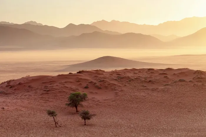 Framed Print : Mountains and sand dunes at sunset, Namib Rand Nature Reserve, Namib Desert, Namibia