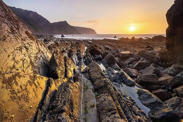 Mouthmill beach and Bideford Bay and Hartland at sunset, Mouthmill, North Devon, England, United Kingdom