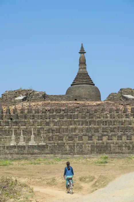 Framed Print : Mrauk-U, Rakhine state, Myanmar. Woman cycling near Koe-Thaung pagoda Framed Print : Mrauk-U, Rakhine state, Myanmar. Woman cycling near Koe-Thaung pagoda