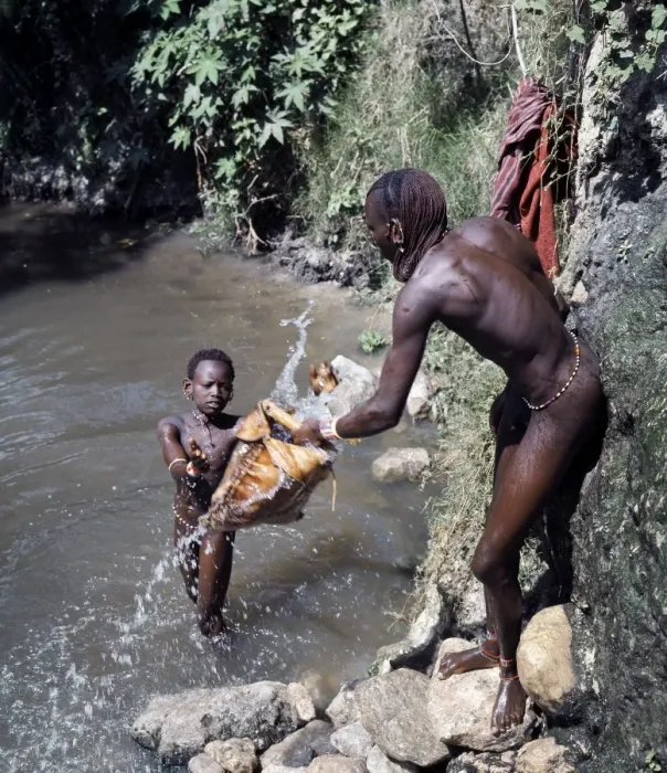 Framed Print : Msai warriors draw water for livestock from a well Framed Print : Msai warriors draw water for livestock from a well