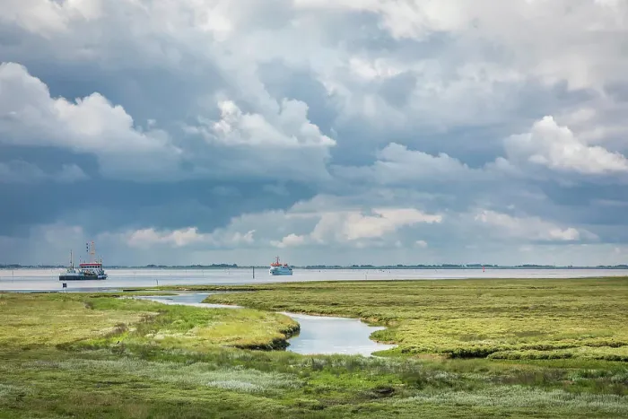 Framed Print : Mudflat landscape on the south coast of Spiekeroog with ferries, East Frisian Islands, East Frisia, Lower Saxony, Germany Framed Print : Mudflat landscape on the south coast of Spiekeroog with ferries, East Frisian Islands, East Frisia, Lower Saxony, Germany