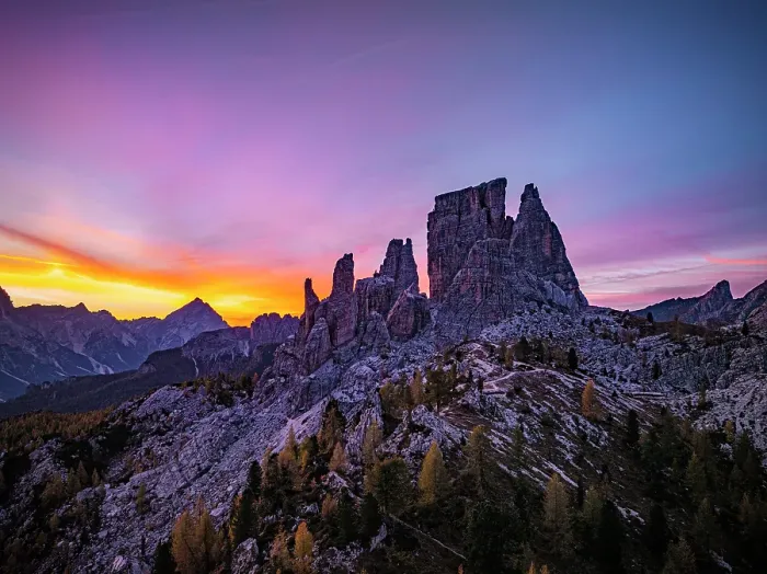 Framed Print : Multicolored sky at dawn over the rocky peaks of Cinque Torri in autumn, Ampezzo Dolomites Natural Park, Veneto, Italy Framed Print : Multicolored sky at dawn over the rocky peaks of Cinque Torri in autumn, Ampezzo Dolomites Natural Park, Veneto, Italy