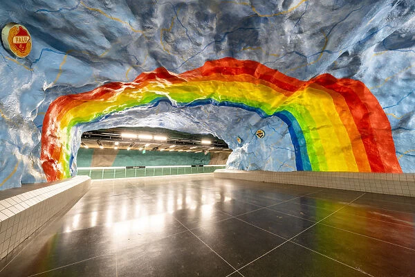 Murals of rainbow on cave walls at Stadion metro station, Stockholm, Sweden
